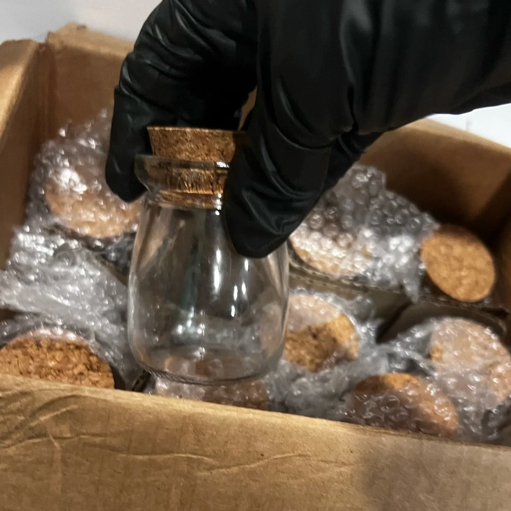 9 Glass Jars with Cork Lids twine, and organic labels